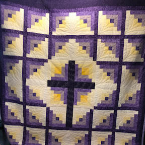 God Sees Me signature quilt with cross in purple and yellow